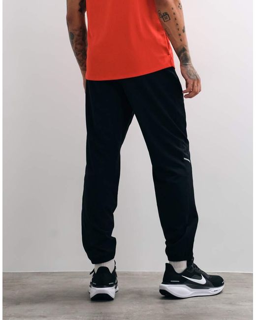 Nike White Miler Dri-Fit Woven Joggers for men