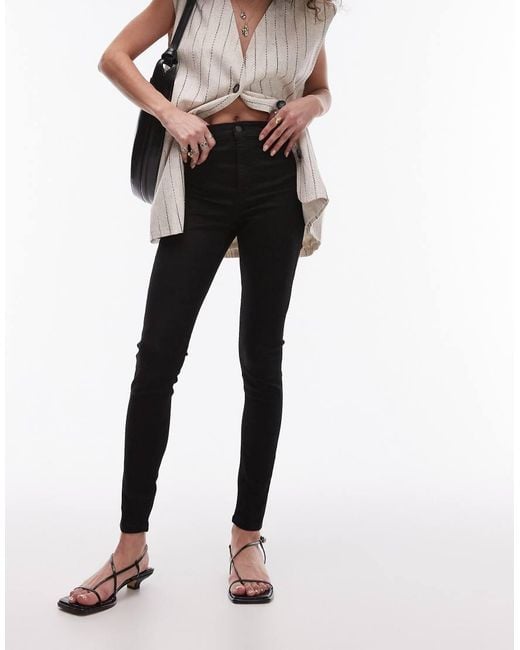 Vaqueros De Corte Superpitillo Y Talle Alto Joni De TOPSHOP de color Black