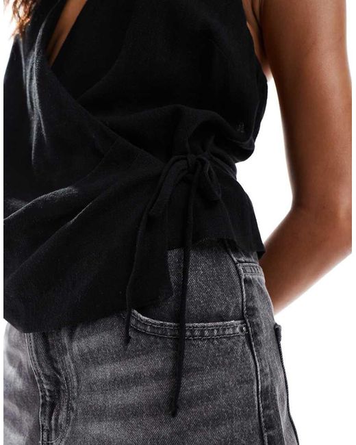 ASOS Mouwloze Gebreide Overslagtop Met Strik Opzij in het Black