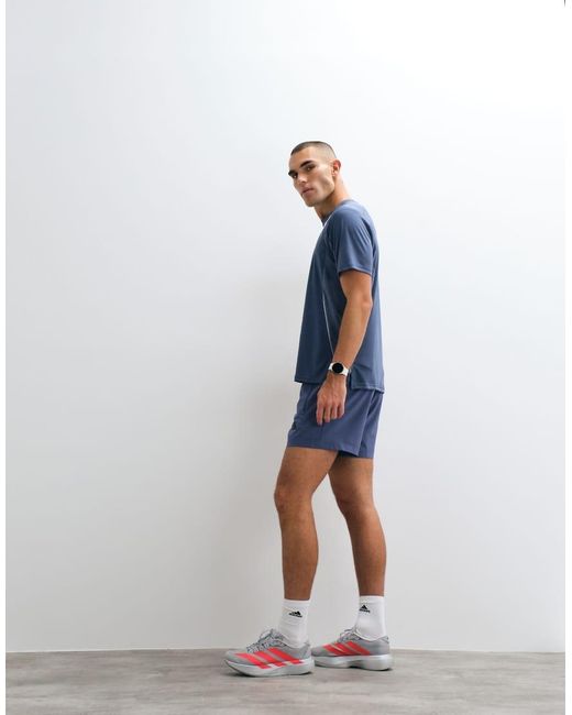 Adidas Originals Blue Adidas Training Essentials Woven Shorts for men