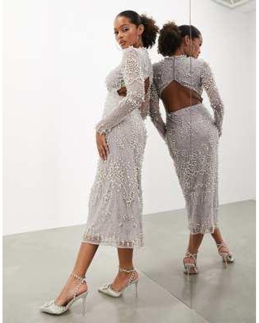 asos design beaded embellished bandeau midi dress in white ASOS LUXE pearl embellished bandeau mini dress in white Masa: 34 Cmimi:90  -25% = 67,50 Retail Proce: 290