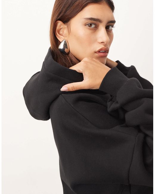 Sweat à capuche oversize épais ARRANGE en coloris Black