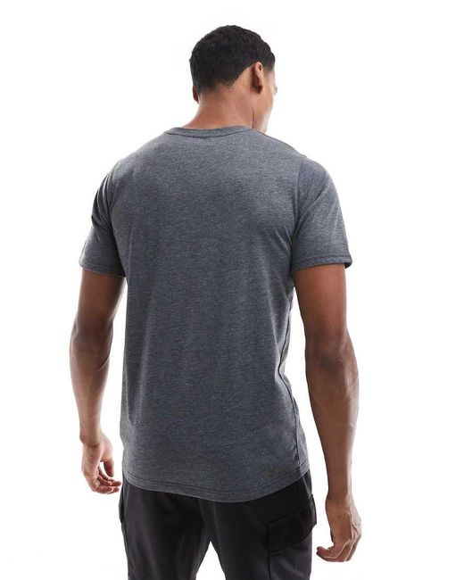 Camiseta Sport Essentials Heathertech De New Balance de hombre de color Blue
