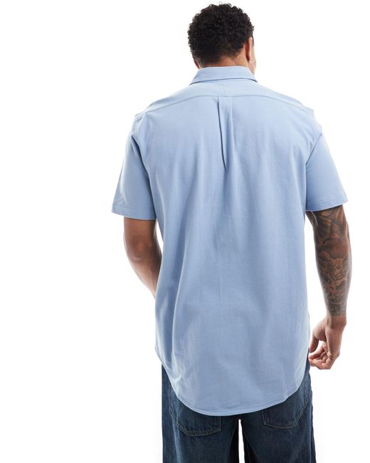 Icon - camicia piqué a maniche corte medio con logo di Polo Ralph Lauren in Blue da Uomo