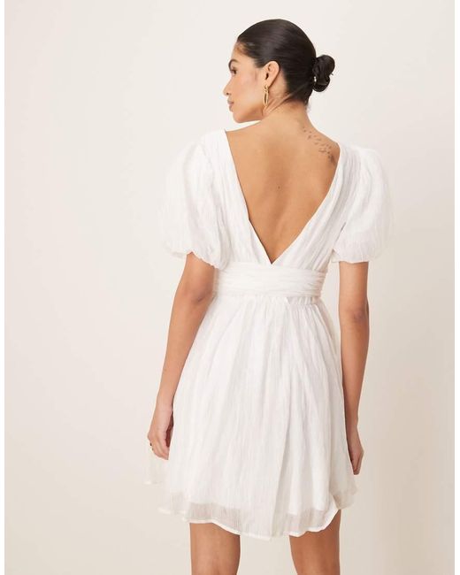Gina Tricot Natural Short Sleeve V Neck Open Back Bow Graduation Mini Dress