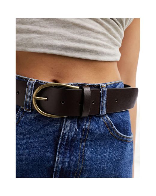 Cintura da jeans per vita e fianchi con fibbia a mezzaluna di ASOS in Blue