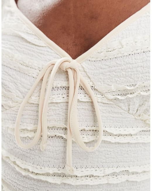 Robe courte texturée à manches bouffantes à nouer sur le devant - crème ASOS en coloris White