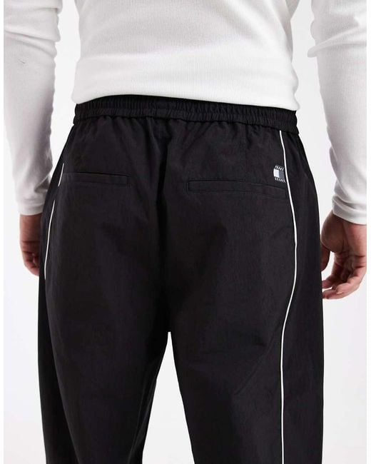Tommy Hilfiger Black Theo Piping Detail Parachute Track Pants for men
