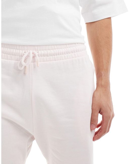 Pantalones cortos rosa claro ASOS de hombre de color White