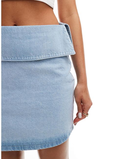 Mini-jupe délavée en jean à rabat ASOS en coloris White