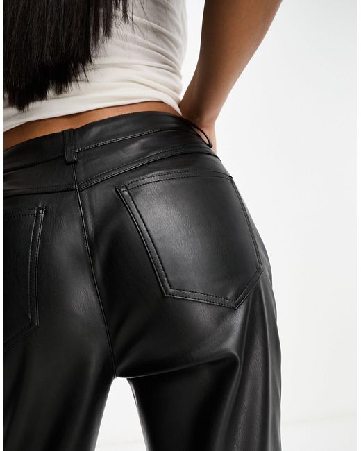 Leather-effect elastic waist trousers - Woman | Mango Cameroon