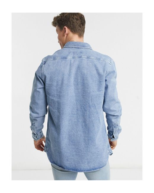 Lacoste – Jeanshemd mit Druckknöpfen in Blau für Herren | Lyst AT