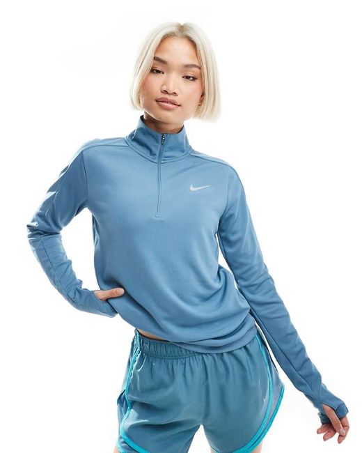 Top Azul De Manga Larga Con Media Cremallera Dri-Fit Pacer De Nike de color Blue