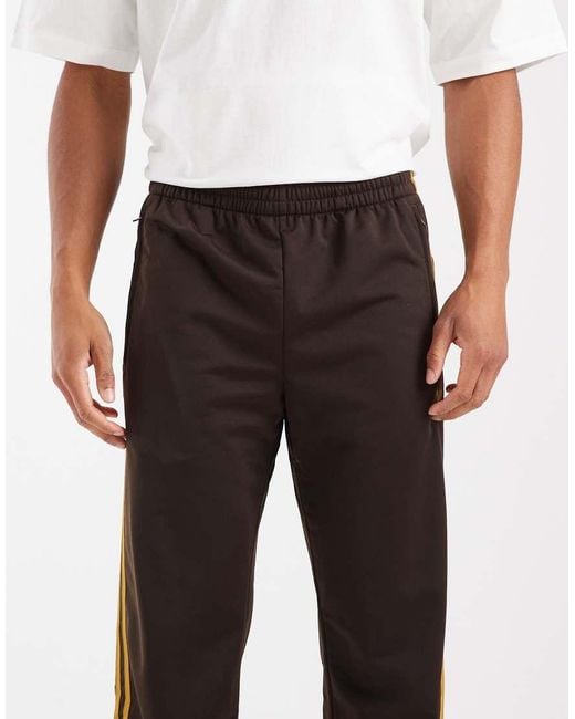 Adidas Originals Natural Firebird Track Pants for men