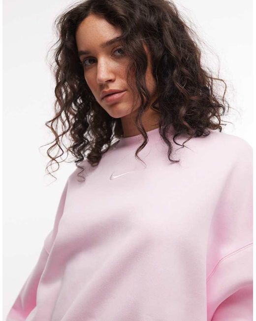 Phoenix di Nike in Pink
