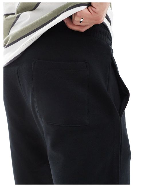 Pantaloncini skinny neri di ASOS in Black da Uomo