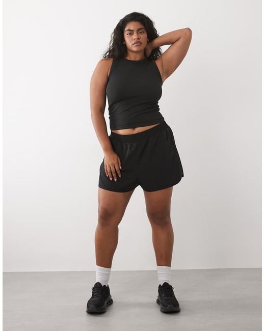 4505 Black Curve Seamless Lightweight Rib 90s Racer Vest