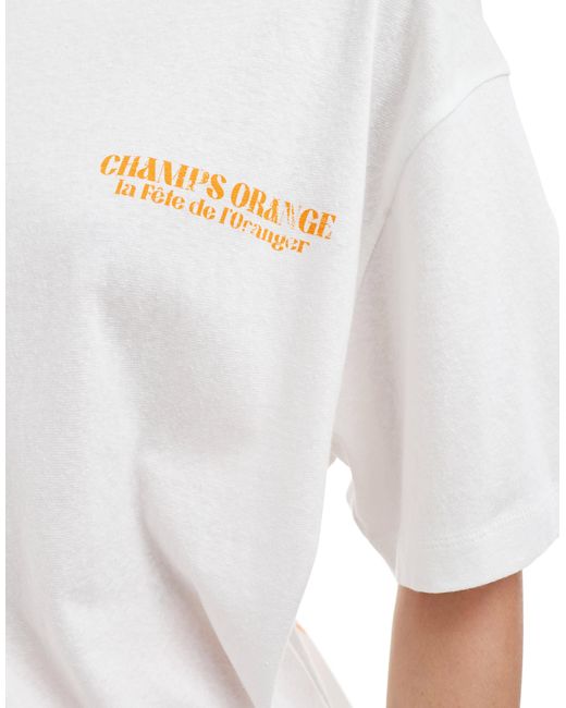 T-shirt oversize en aspect lin avec imprimé orange au dos ASOS en coloris White