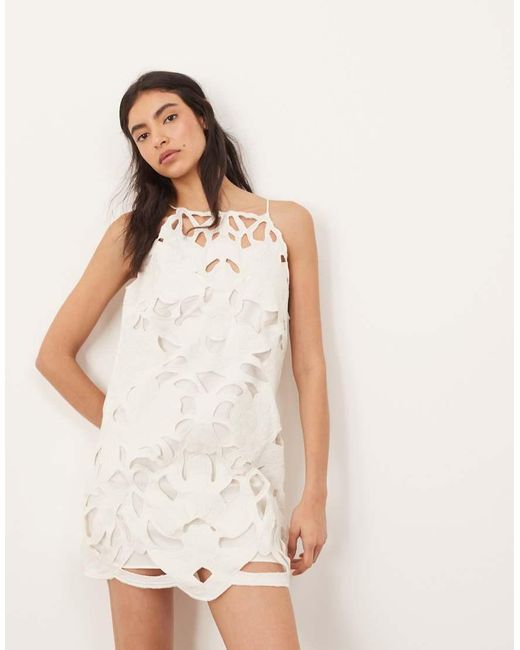 ARRANGE White Floral Cut Work Halterneck Mini Dress With Contrast Stitch