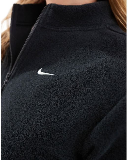 Phoenix - top en polaire à manches longues et col zippé Nike en coloris Black