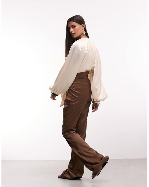 The Dolls House Natural Anthia Premium Satin Plunge Neck Balloon Sleeve Flared Jumpsuit