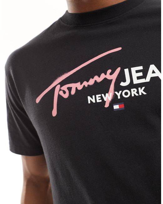T-shirt unisexe coupe classique avec logo effet peint Tommy Hilfiger en coloris Black