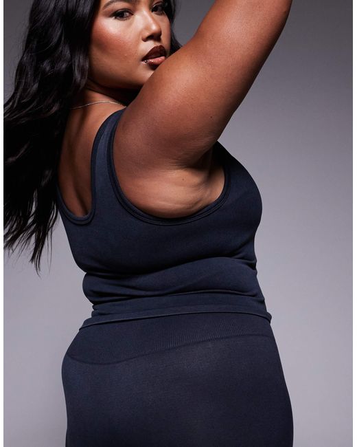 Curve - débardeur sans coutures à col v avec brassière intégrée - délavé 4505 en coloris Blue