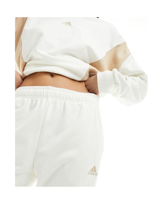 Adidas training - tuta sportiva sporco di Adidas Originals in White