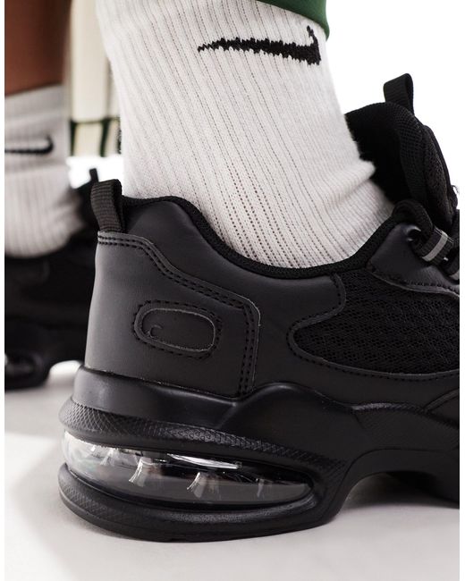 Sneakers sportive nere di Truffle Collection in Black