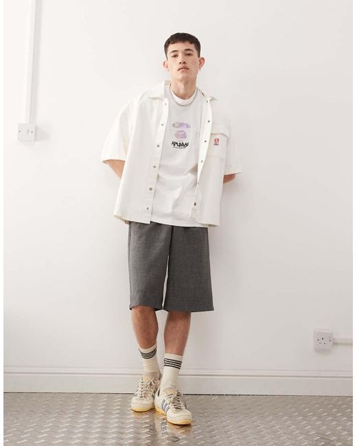 Aape By A Bathing Ape di Aape By A Bathing Ape in White da Uomo