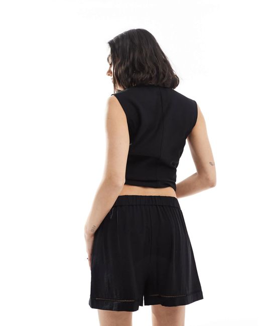 Short d'ensemble ajusté à bordure en échelle ASOS en coloris Black