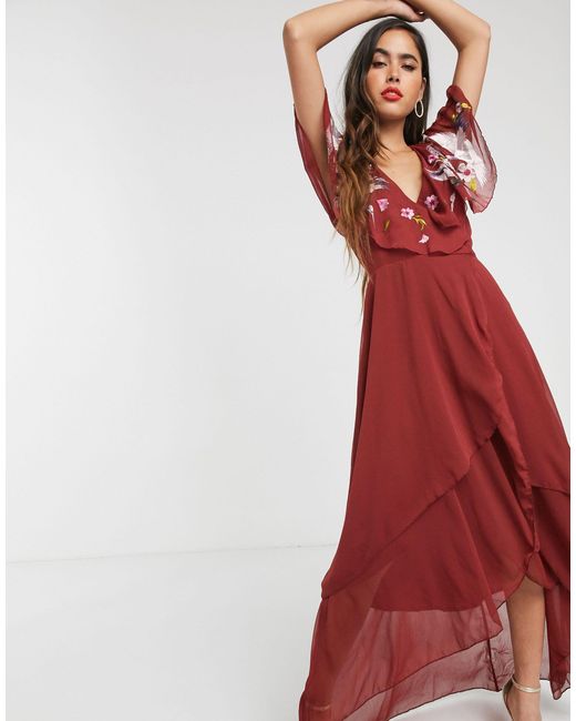 maxi dress with cape back and dipped hem