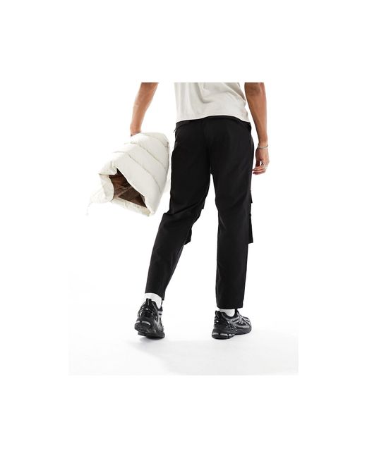 Pantaloni cargo slim neri di ADPT in Black da Uomo