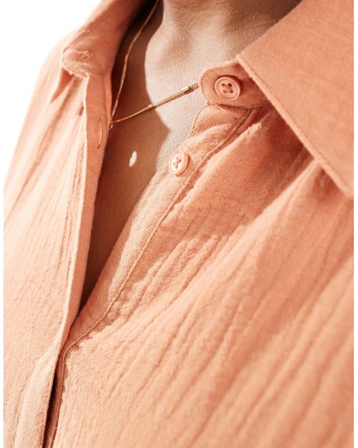 Asos design curve - robe chemise sans manches coupe babydoll en tissu double épaisseur - rouille ASOS en coloris Orange