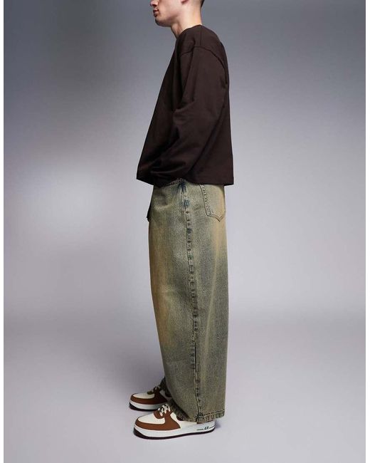 Vaqueros Azul Claro Holgados Y Extragrandes Con Tintado Desgastado De ASOS de hombre de color Brown