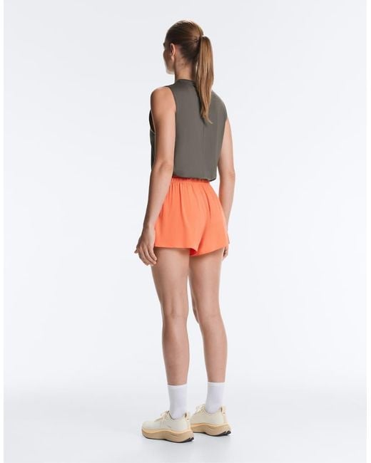 Oysho Orange Mid-rise Technical Shorts 7cm