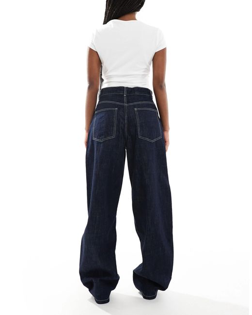 Jean bouffant ample - indigo délavé Bershka en coloris Blue