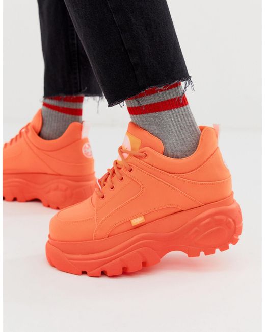 fluorescent orange sneakers