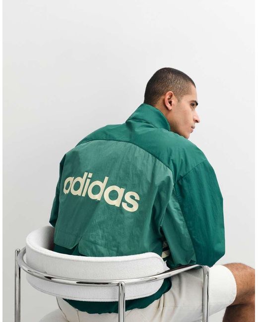 Adidas Originals Green Munich Woven Track Top for men