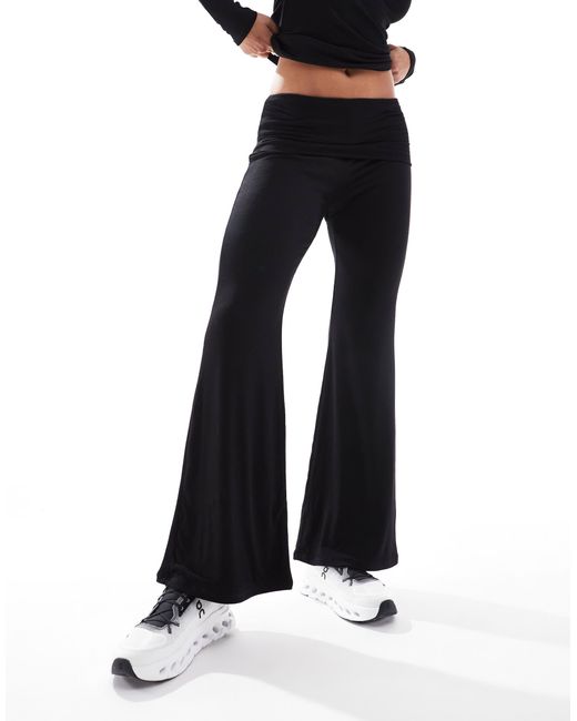 Pantalon double épaisseur évasé en jersey côtelé à taille rabattue South Beach en coloris Black