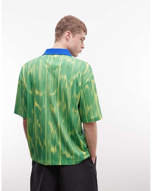 ASOS Green Boxy Oversized Polo With All Over Print And Brazil Football Graphic for men