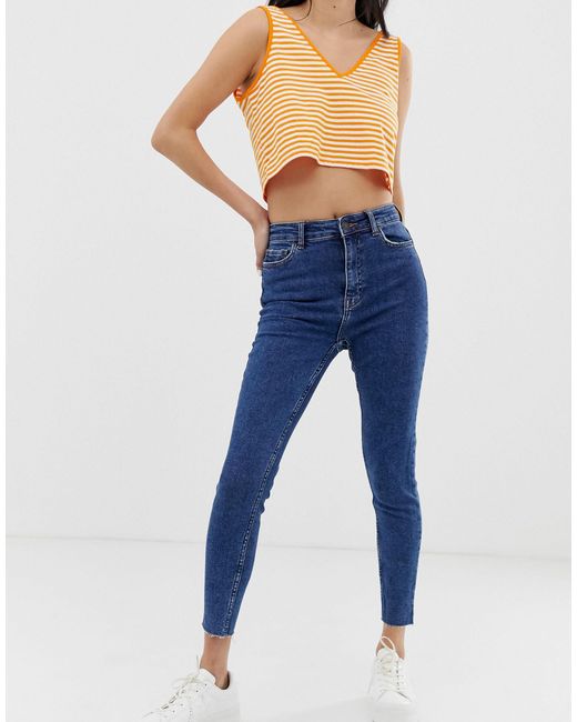 super high waisted blue jeans