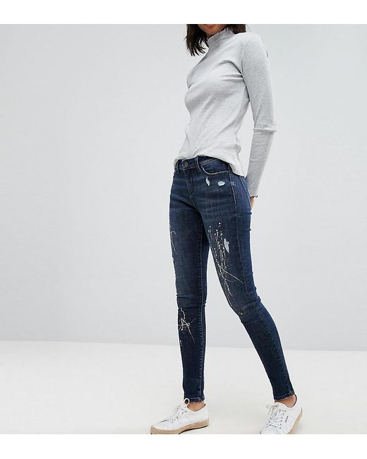 Esprit Enge Jeans mit Farbspritzern in Blau | Lyst DE