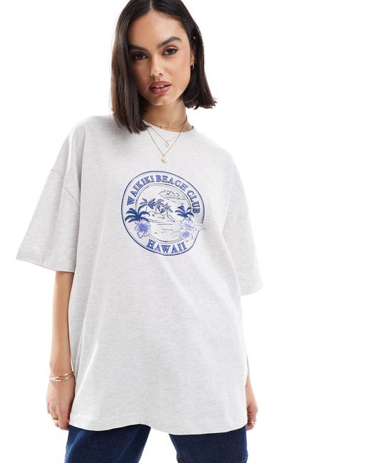 T-shirt boyfriend ghiaccio mélange con grafica di palme "hawaii beach" di ASOS in White