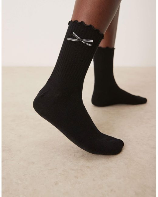 Chaussettes à bord supérieur volanté et nœud à carreaux vichy ASOS en coloris Black