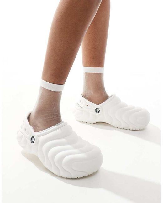 Lined white crocs sales