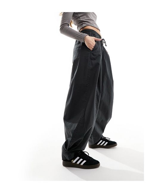 Pantalones gris lavado holgados sin cierres con detalle ASOS de color Black