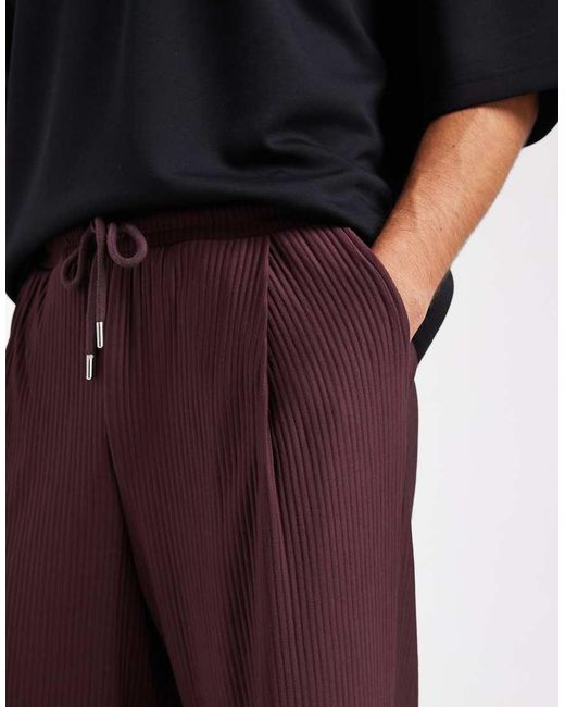 ASOS Black Relaxed Taper Pleated jogger for men