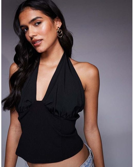 Top Corsetero Con Cuello Halter Ceñido De ASOS de color Blue