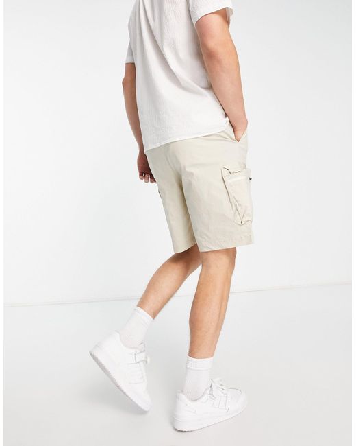 Short cargo ample en tissu technique Homme Vêtements Shorts Shorts fluides/cargo beige Coton SELECTED pour homme en coloris Neutre 
